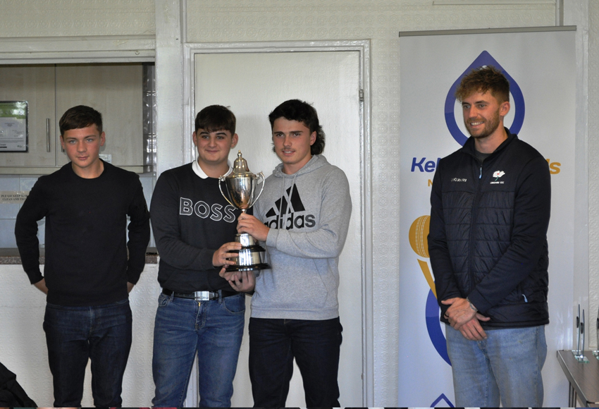 Kettlewell Fuels The Nidderdale Junior Cricket League Under 18 league winners showing their trophy, with Ben Coad, the famous Yorkshire cricketer, who presented the awards at the event.